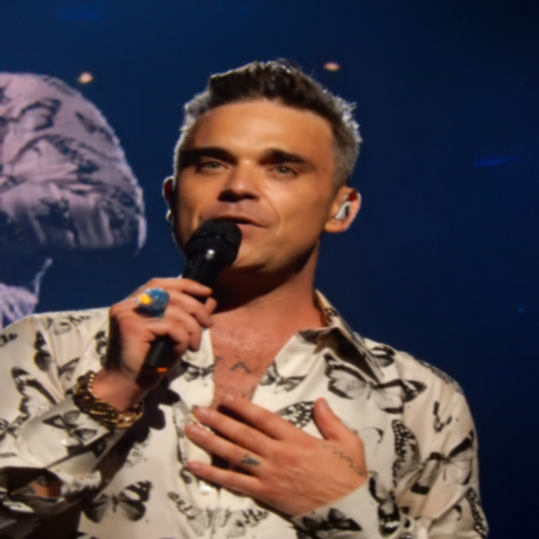 Robbie Williams bei einem Auftritt